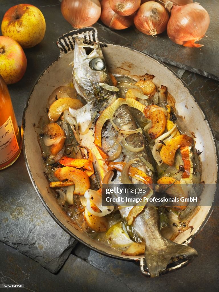 Trout baked with apples,onions and cider