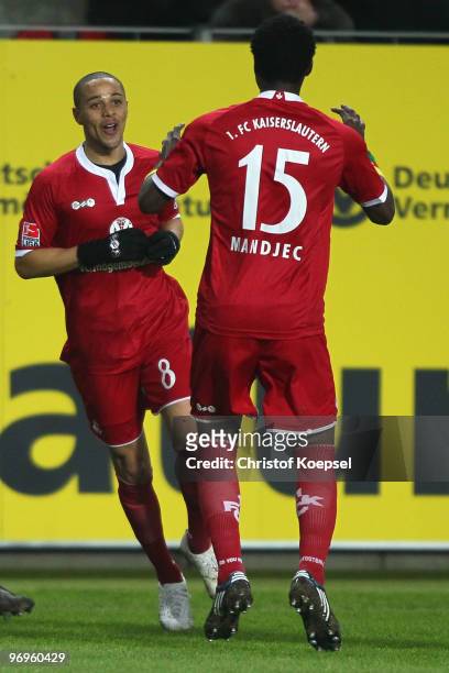 Sidney Sam of Kaiserslautern celebrates the first goal with team mate Georges Mandjeck during the Second Bundesliga match between 1.FC Kaiserslautern...