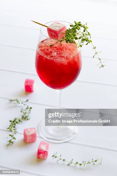 a red cocktail with granita garnished with turkish delight - turkish delight stock pictures, royalty-free photos & images