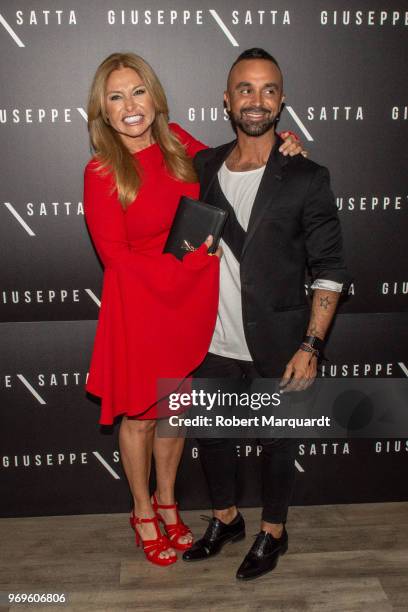 Cristina Tarrega and Luis Rollan pose during a photocall for the new collection by Giuseppe Satta at the El Avenida Palace Hotel on June 7, 2018 in...