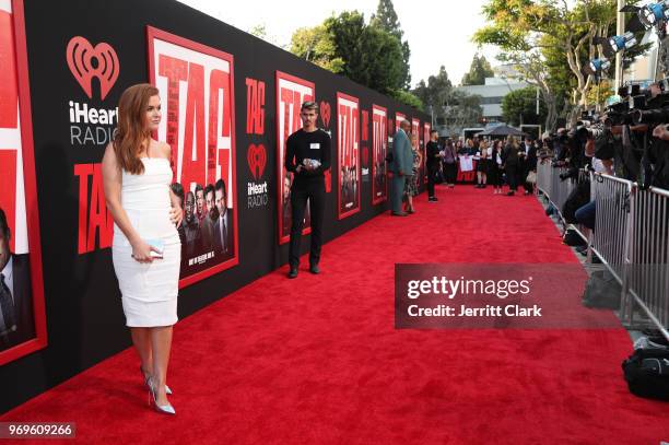 Isla Fisher walks the red carpet at the premiere of Warner Bros. Pictures And New Line Cinema's "Tag" at Regency Village Theatre on June 7, 2018 in...