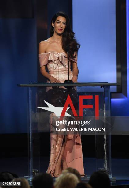 British-Lebanese barrister and wife Amal Clooney addresses the crowd during the 46th American Film Institute's Life Achievement Award Gala Tribute at...