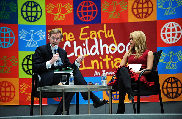 Recording artist Shakira Mebarak, founder of ALAS Foundation, looks on as World Bank President Robert Zoellick answers a question during a town hall...