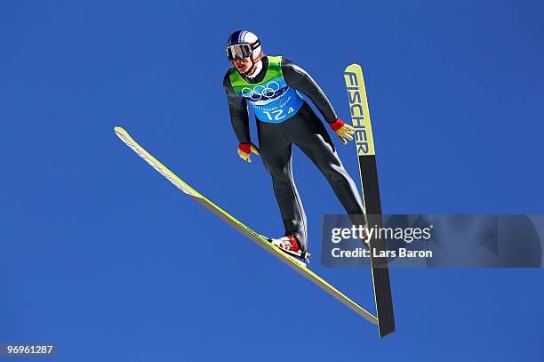 Gregor Schlierenzauer of Austria competes in the men's ski jumping team event on day 11 of the 2010 Vancouver Winter Olympics at Whistler Olympic...