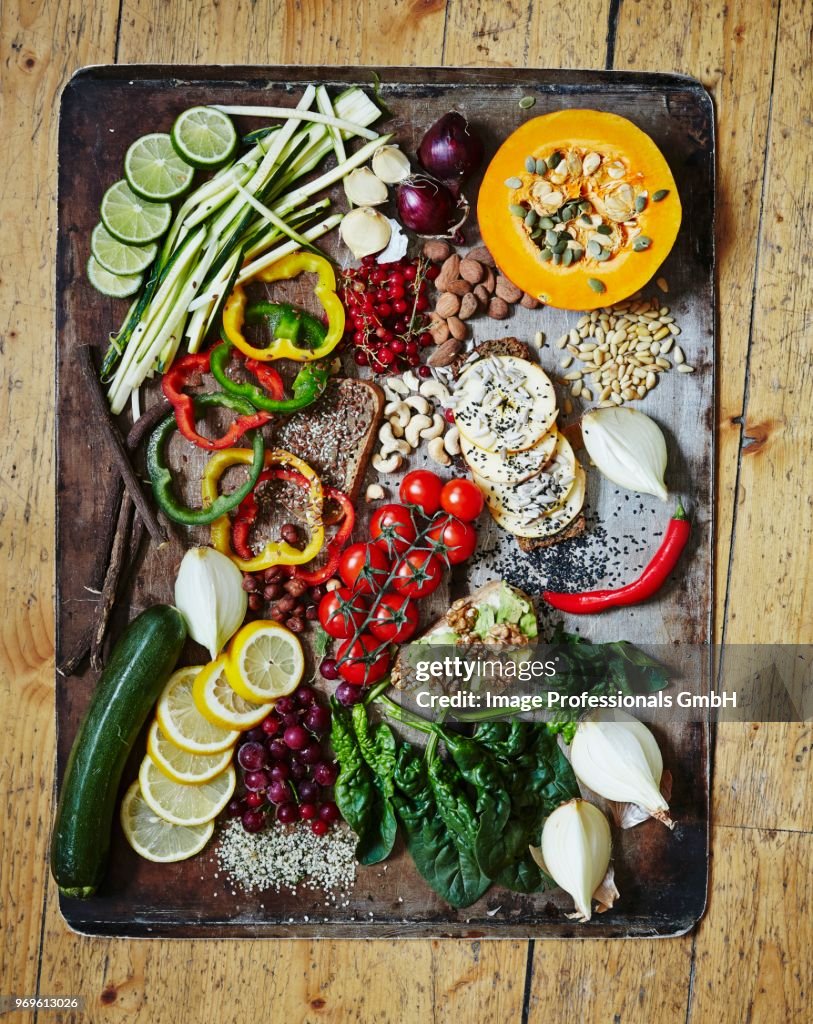 Various vegetables on a vintage tray Healthy greens