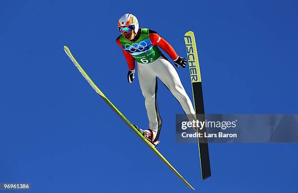 Taku Takeuchi of Japan competes in the men's ski jumping team event on day 11 of the 2010 Vancouver Winter Olympics at Whistler Olympic Park Ski...