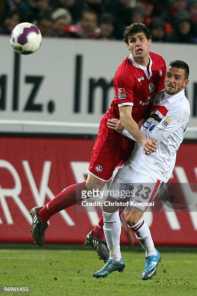 Deniz Naki of St. Pauli challenges Florian Dick of Kaiserslautern during the Second Bundesliga match between 1.FC Kaiserslautern and FC St. Pauli at...
