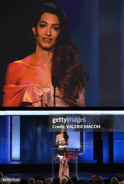 British-Lebanese barrister and wife Amal Clooney addresses the crowd during the 46th American Film Institute's Life Achievement Award Gala Tribute at...