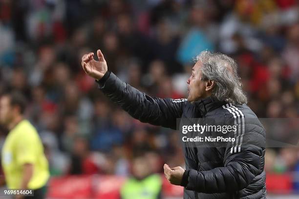 Algerias head coach Rabah Madjer gestures during the FIFA World Cup Russia 2018 preparation football match Portugal vs Algeria, at the Luz stadium in...