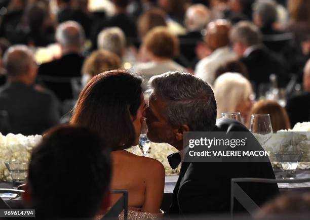 Actor George Clooney and his wife British-Lebanese barrister Amal Clooney attend the 46th American Film Institute Life Achievement Award Gala at the...