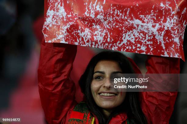 Portugal's supporter waving a chart during a friendly match Portugal x Argelia in Luz Stadium Lisbon, on June 7, 2018.