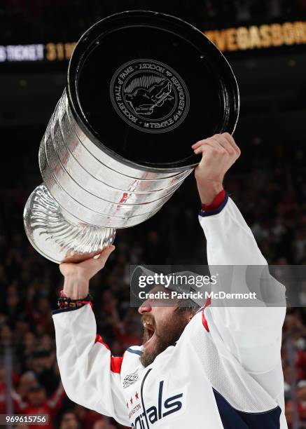 Alex Ovechkin of the Washington Capitals celebrates with the Stanley Cup after his team defeated the Vegas Golden Knights 4-3 in Game Five of the...