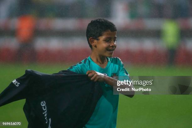 Portugal forward Cristiano Ronaldo son Cristianinho plays with is father at the end of the International Friendly match between Portugal and Algeria...