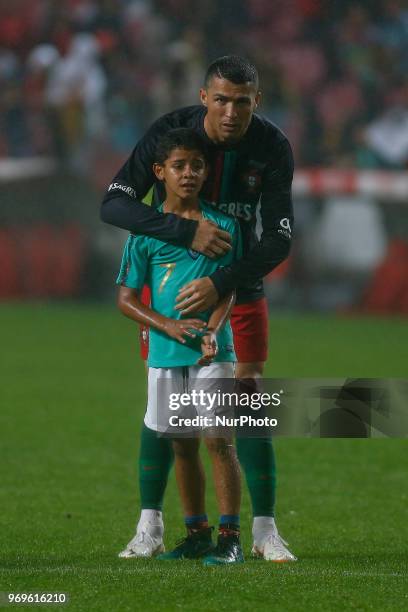 Portugal forward Cristiano Ronaldo son Cristianinho plays with is father at the end of the International Friendly match between Portugal and Algeria...
