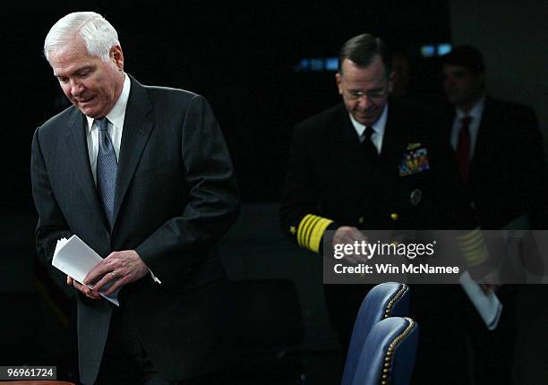 Secretary of Defense Robert M. Gates and Chairman of the Joint Chiefs of Staff Adm. Mike Mullen arrive to conduct a press briefing February 22, 2010...