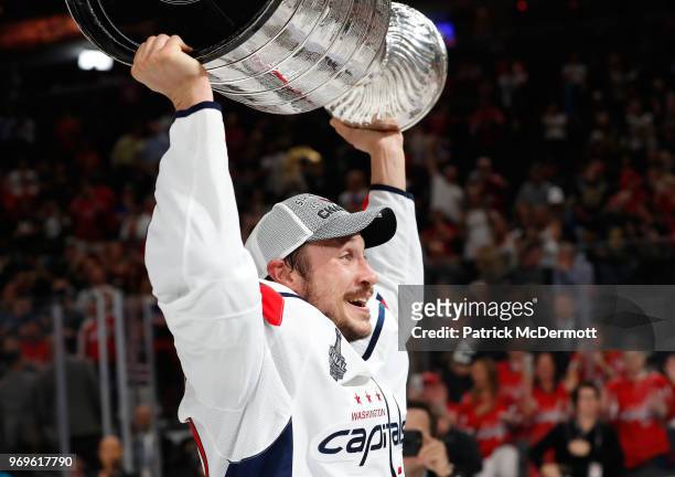 Jay Beagle of the Washington Capitals hoists the Stanley Cup after Game Five of the 2018 NHL Stanley Cup Final between the Washington Capitals and...