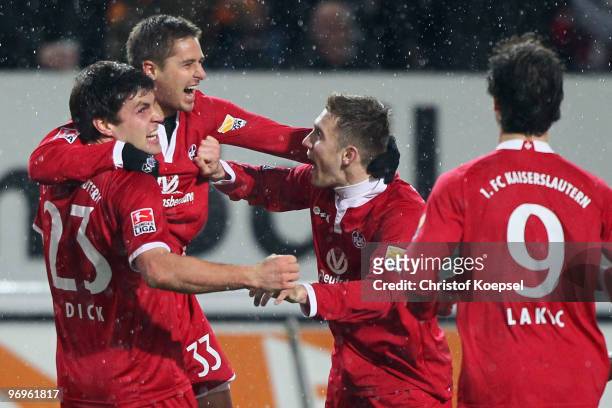 Markus Steinhoefer of Kaiserslautern celebrates the second goal with Florian Dick and Erik Jendrisek during the Second Bundesliga match between 1.FC...