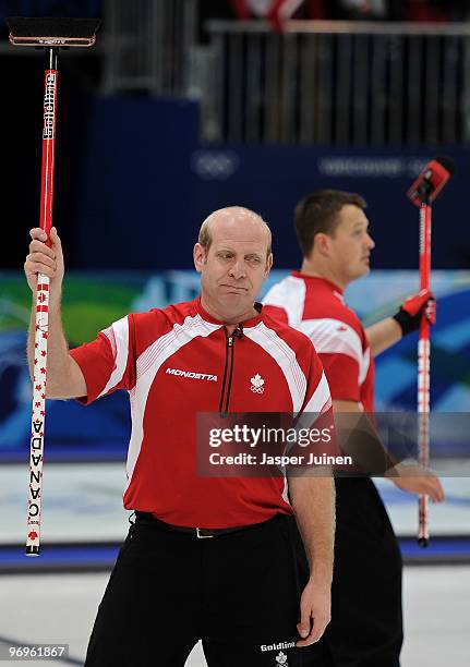 Skip Kevin Martin of Canada celebrates at the end of the men's curling round robin game between Canada and the USA on day 11 of the Vancouver 2010...