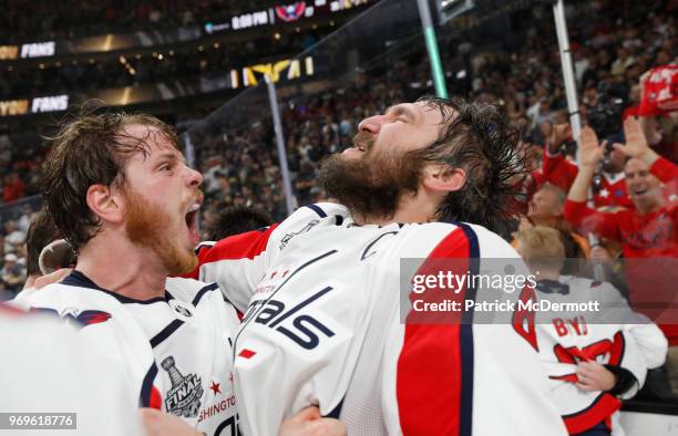 Alex Ovechkin and John Carlson of the Washington Capitals celebrate winning the Stanley Cup after their team defeated the Vegas Golden Knights 4-3 in...