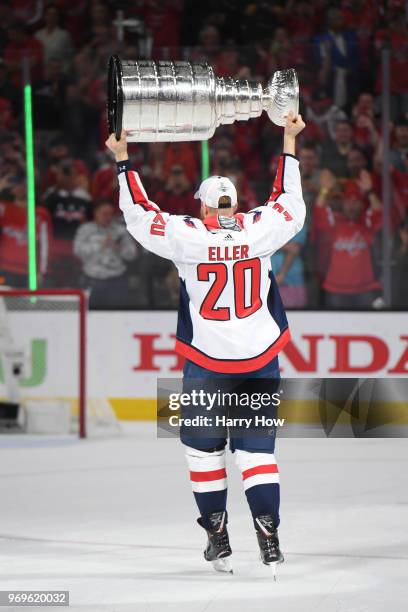 Lars Eller of the Washington Capitals hoists the Stanley Cup after his team defeated the Vegas Golden Knights 4-3 in Game Five of the 2018 NHL...