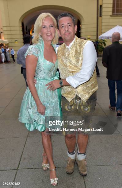 Astrid Soell, dirndl fashion designer, and her husband Volker Woehrle during the 70th anniversary celebration of the clothing company Angermaier at...