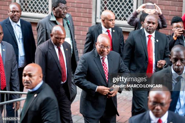 Former South African President Jacob Zuma arrives at the Durban Magistrate Court in Durban, on June 8, 2018 to face over 16 corruption charges.