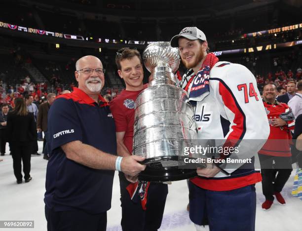 John Carlson of the Washington Capitals poses with the Stanley Cup after his team defeated the Vegas Golden Knights 4-3 in Game Five of the 2018 NHL...