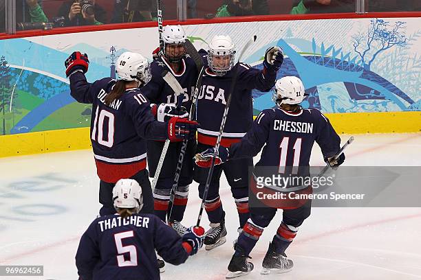 Angela Ruggiero of the United States celebrates scoring the third goal with Jocelyne Lamoureux, Meghan Duggan, Lisa Chesson and Karen Thatcher during...