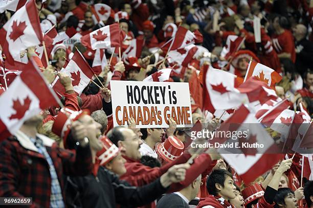 Winter Olympics: Team Canada fans in stands during Men's Preliminary Round - Group A Game 17 vs USA at Canada Hockey Place. Vancouver, Canada...
