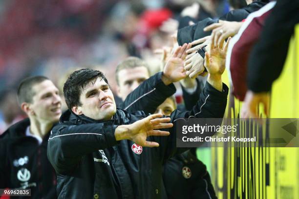 Florian Dick of Kaiserslautern celebrates the 3-0 victory with the fans after the Second Bundesliga match between 1.FC Kaiserslautern and FC St....