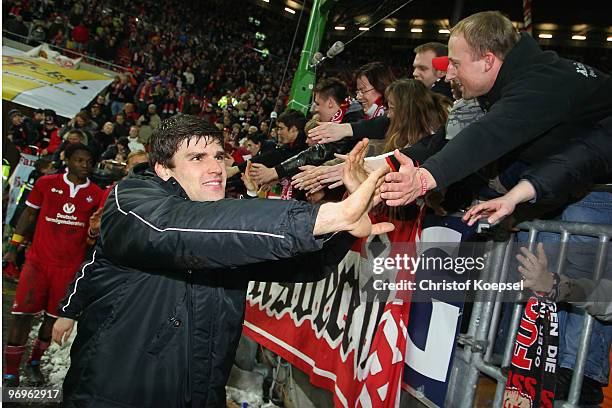 Florian Dick of Kaiserslautern celebrates the 3-0 victory with the fans after the Second Bundesliga match between 1.FC Kaiserslautern and FC St....