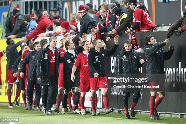 The team of Kaiserslautern celebrates the 3-0 victory after the Second Bundesliga match between 1.FC Kaiserslautern and FC St. Pauli at Fritz-Walter...