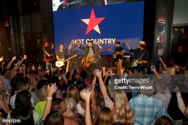 Hunter Hayes and Cale Dodds perform on stage at Spotify's Hot Country Presents Hunter Hayes, Chris Lane, Michael Ray and more at Ole Red During CMA...