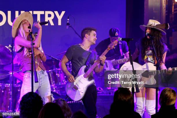 The Sisterhood and Hunter Hayes perform on stage at Spotify's Hot Country Presents Hunter Hayes, Chris Lane, Michael Ray and more at Ole Red During...