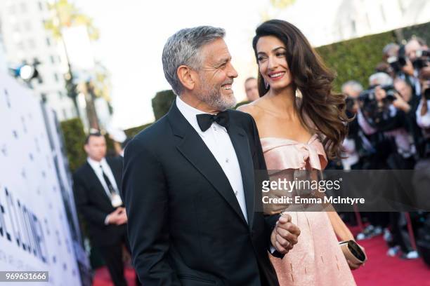 Amal Clooney and George Clooney attend the American Film Institute's 46th Life Achievement Award Gala Tribute to George Clooney at Dolby Theatre on...