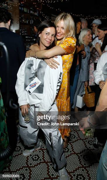 Charlotte Stockdale and Sienna Miller attend CHAOS x LOVE magazine party on June 7, 2018 in New York City.