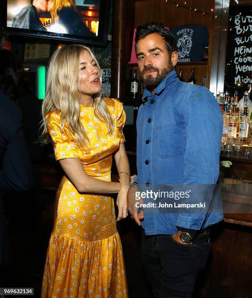 Sienna Miller and Justin Theroux attend CHAOS x LOVE magazine party on June 7, 2018 in New York City.