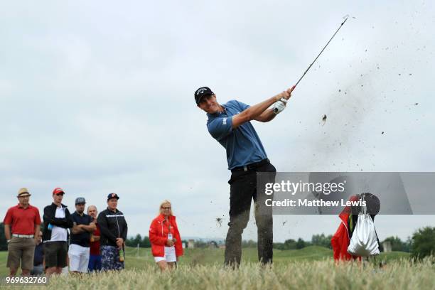 Nicolas Colsaerts of Belgium plays his second shot on the 12th hole during day two of The 2018 Shot Clock Masters at Diamond Country Club on June 8,...