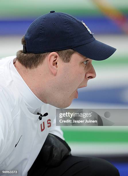 Skip John Shuster of the USA follows the stone during the men's curling round robin game between Canada and the USA on day 11 of the Vancouver 2010...