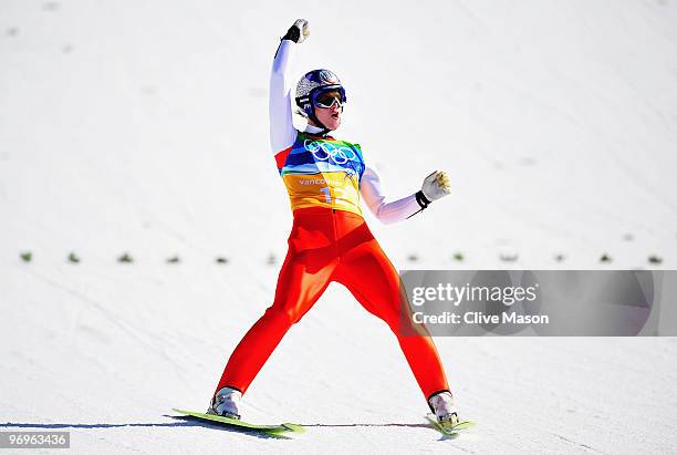 Andreas Kofler of Austria reacts after he competes in the men's ski jumping team event on day 11 of the 2010 Vancouver Winter Olympics at Whistler...