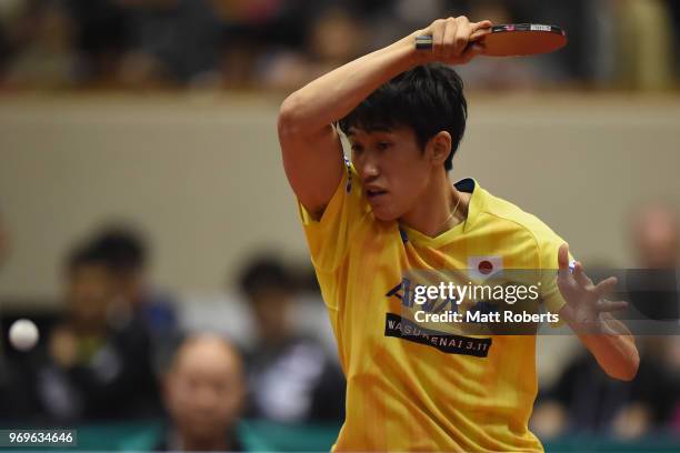 Maharu Yoshimura of Japan competes against Tiago Apolonia of Portugal during the men's singles round one match on day one of the ITTF World Tour LION...