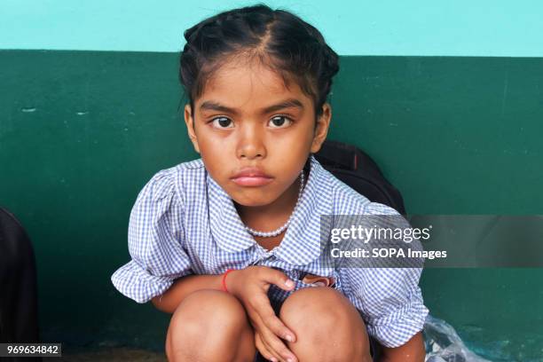 Schoolgirl at Happy Chandara School is waiting for the next classes to start. There are over 1100 girls at the school where food and clothing are...