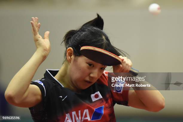 Miyu Nagasaki of Japan competes against Xingtong Chen of China during the women's singles round one match on day one of the ITTF World Tour LION...