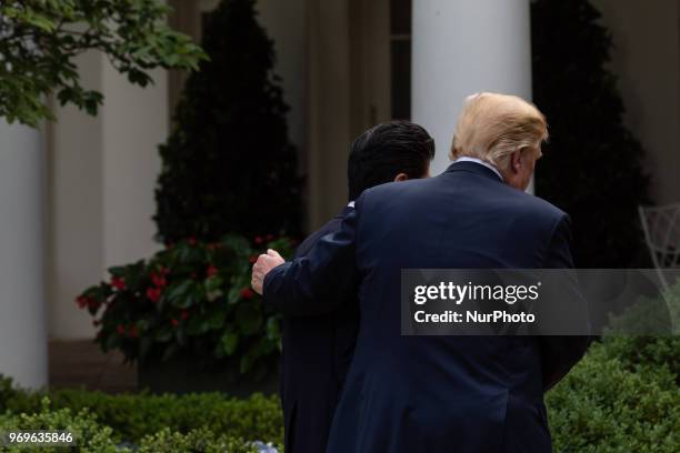 Prime Minister of Japan Shinz Abe, and U.S. President Donald Trump leave their joint press conference in the Rose Garden at the White House in...