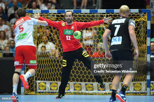 Silvio Heinevetter of Germany tries to defend the ball during the handball International friendly between Germany and Norway at Olympiahalle on June...