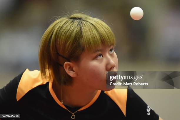 Xingtong Chen of China competes against Miyu Nagasaki of Japan during the women's singles round one match on day one of the ITTF World Tour LION...