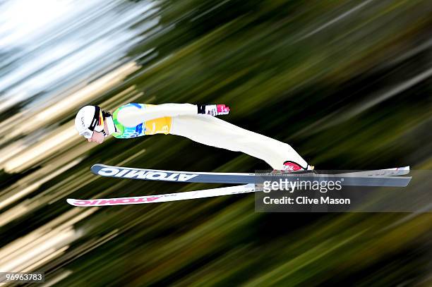 Martin Schmitt of Germany competes in the men's ski jumping team event on day 11 of the 2010 Vancouver Winter Olympics at Whistler Olympic Park Ski...