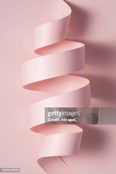 abstract paper stripe coil - verdreht stock-fotos und bilder