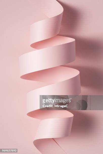 abstract paper stripe coil - curled up - fotografias e filmes do acervo