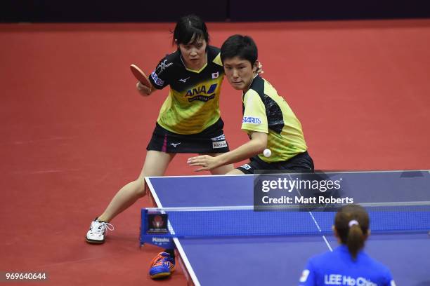 Miu Hirano and Tomokazu Harimoto of Japan compete against Ching Ho Lee and Kwan Ho of Hong Kong during the mixed doubles quarter-final match on day...